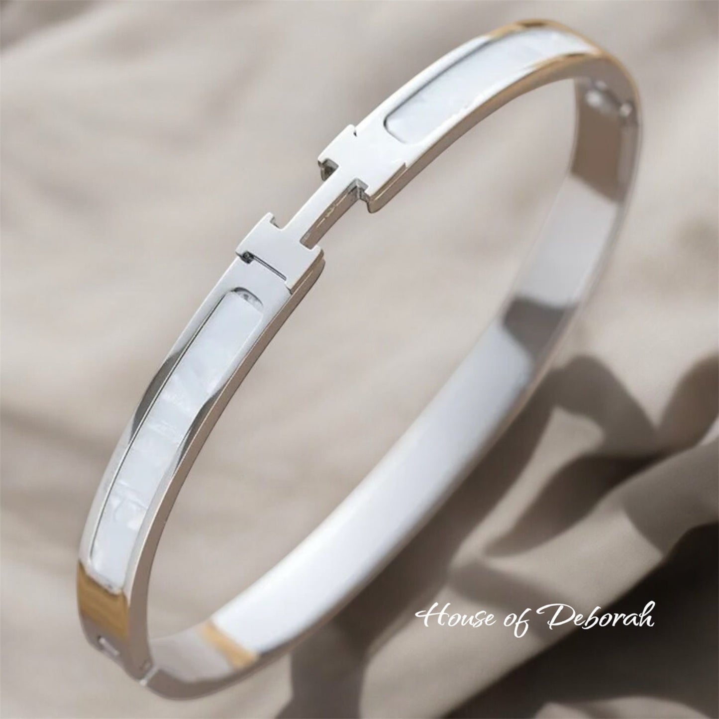 THE "H SIGNATURE" STAINLESS STEEL BRACELET